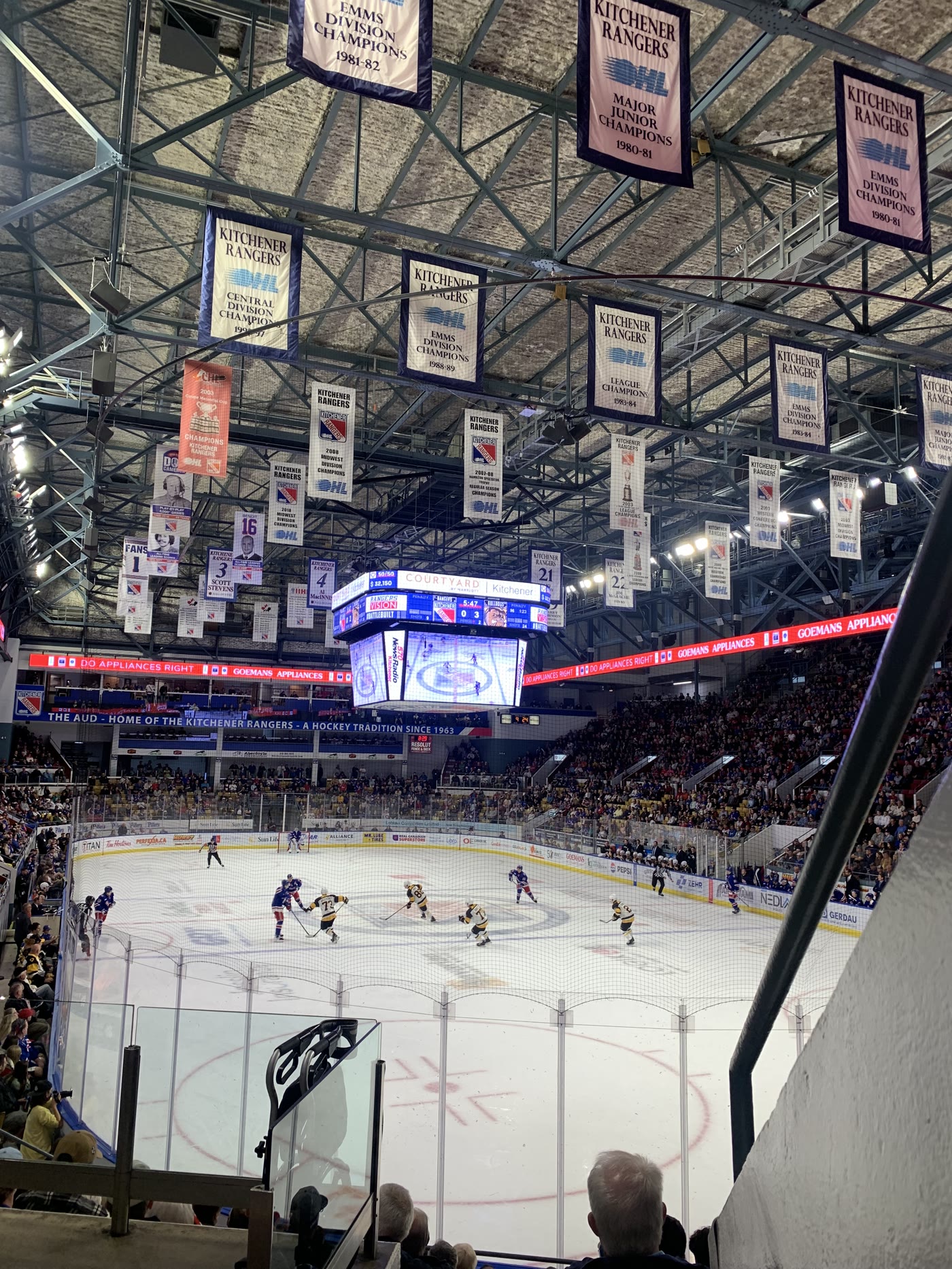 Kitchener Rangers arena with sponsor ribbons and the central jumbotron